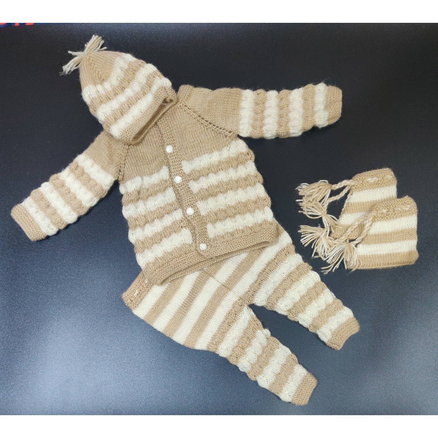 Hand knitted sweater set