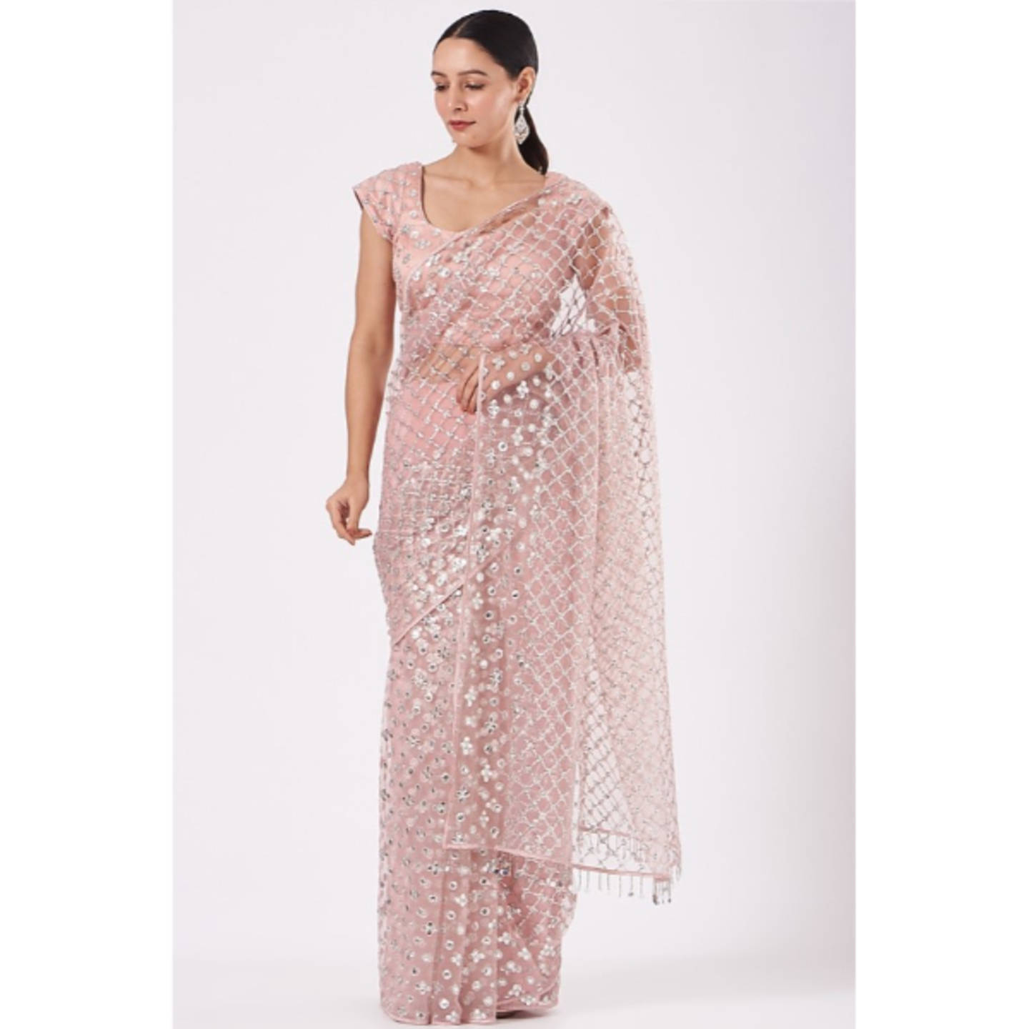 PERIWINKLE  A GLAMOROUS blush pink tulle saree in silver embroidery.