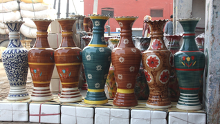 glazed-flower-pots-lined-outside-a-shop.jpg
