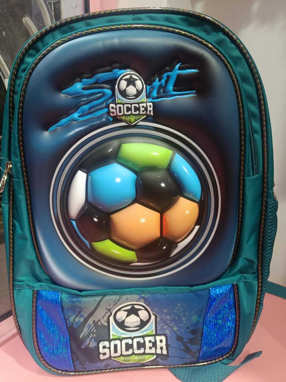 Esmi- *Hardcase School bag*

Size Aprox 19", 3 section, 1 front pocket..1 side pocket 

Theme Football

Price 710/-
