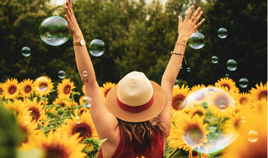 photography-of-woman-surrounded-by-sunflowers-1263986.jpg