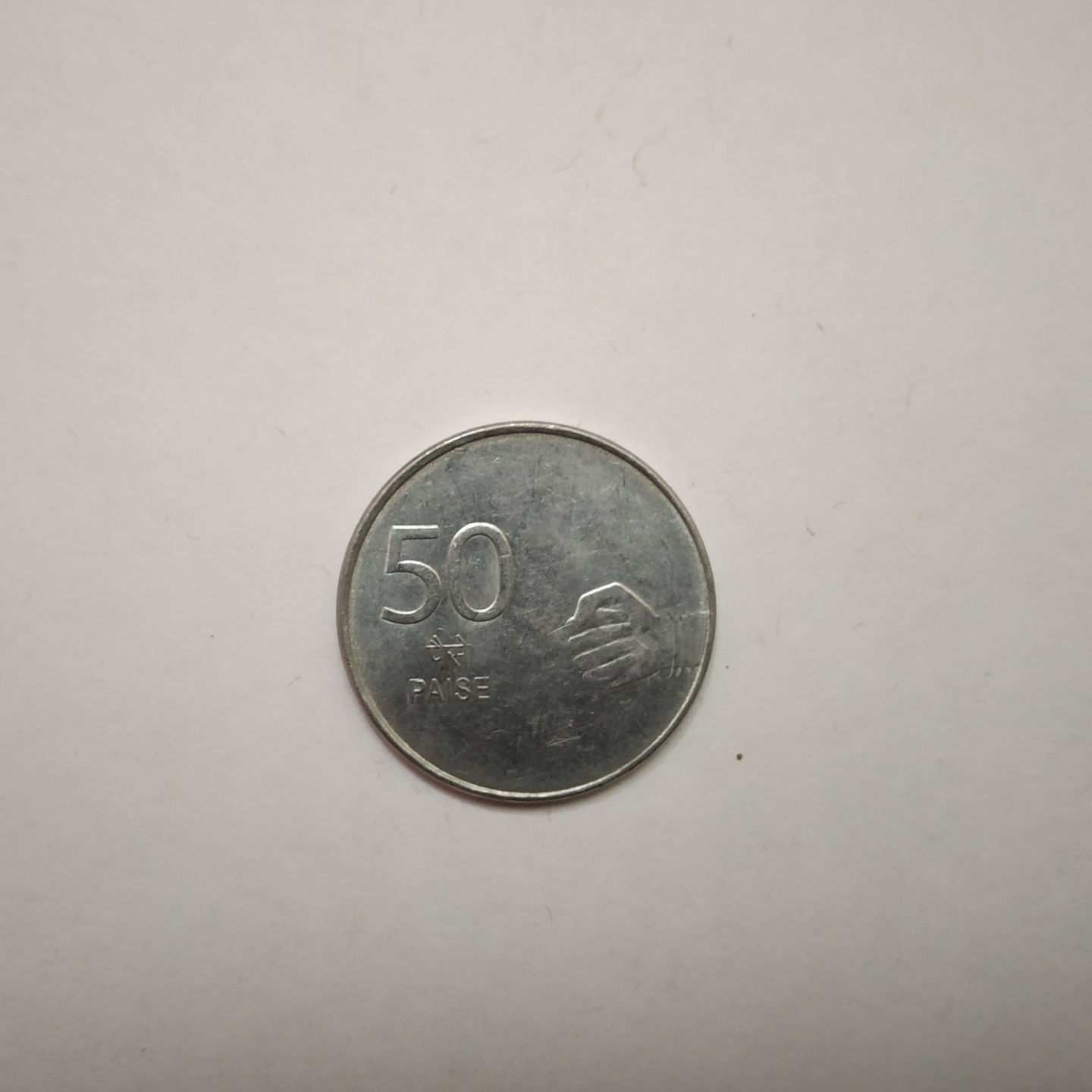 Half Thumb Coin