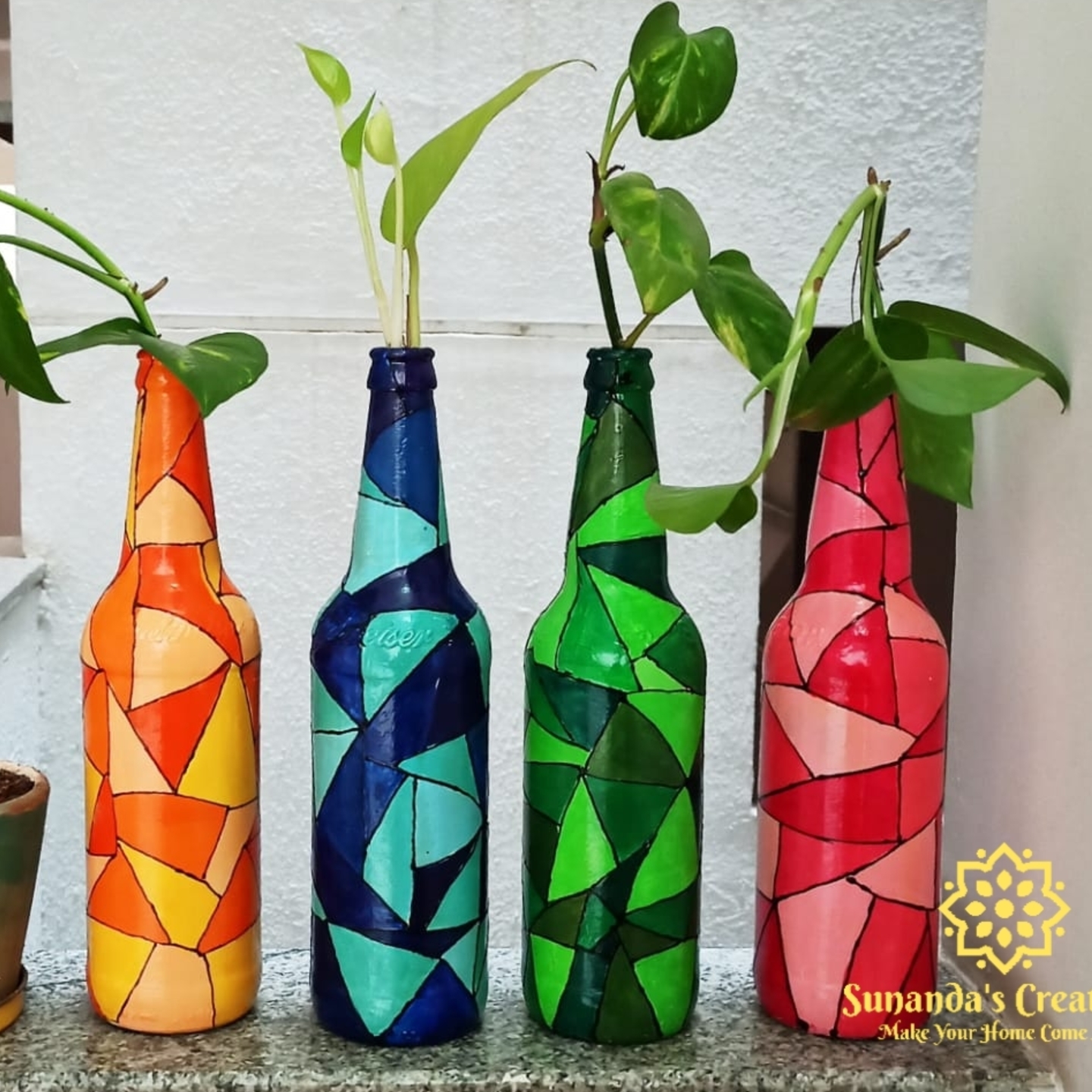 Geomatric designed bottle arthand painted vase