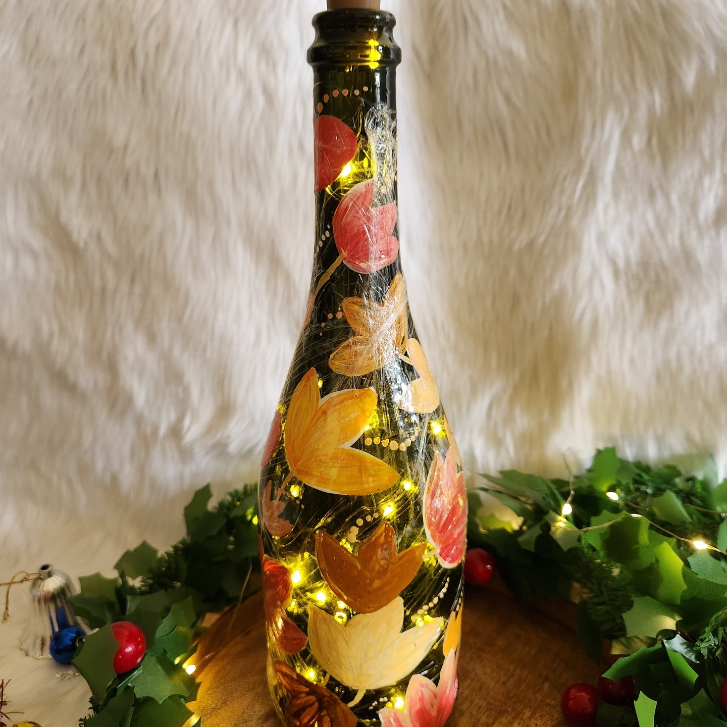 Christmas themed handpainted bottle art