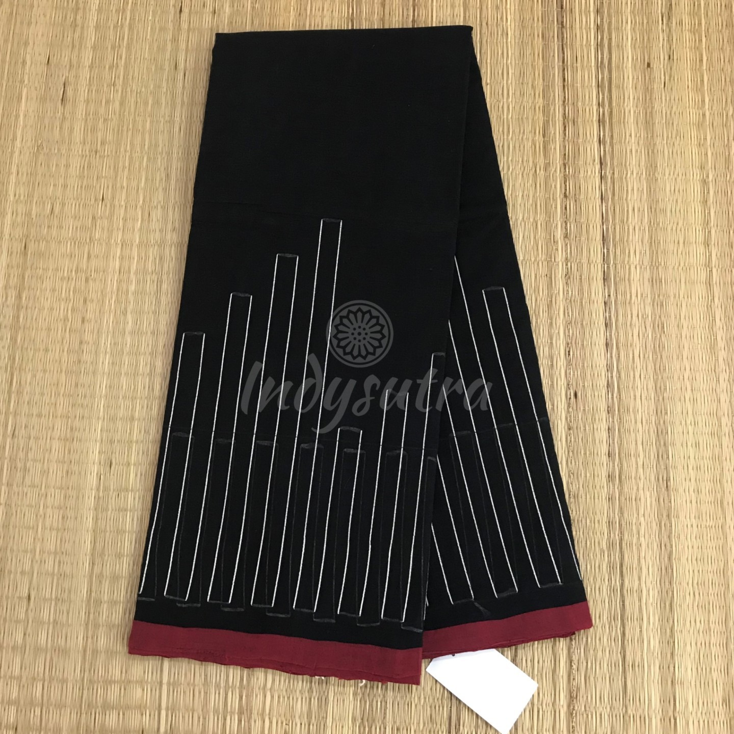 Black saree with small red border