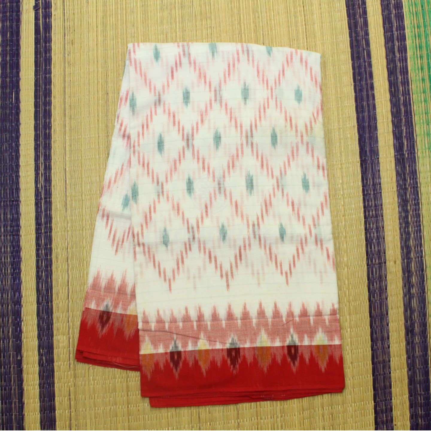 White with red border ikkat saree