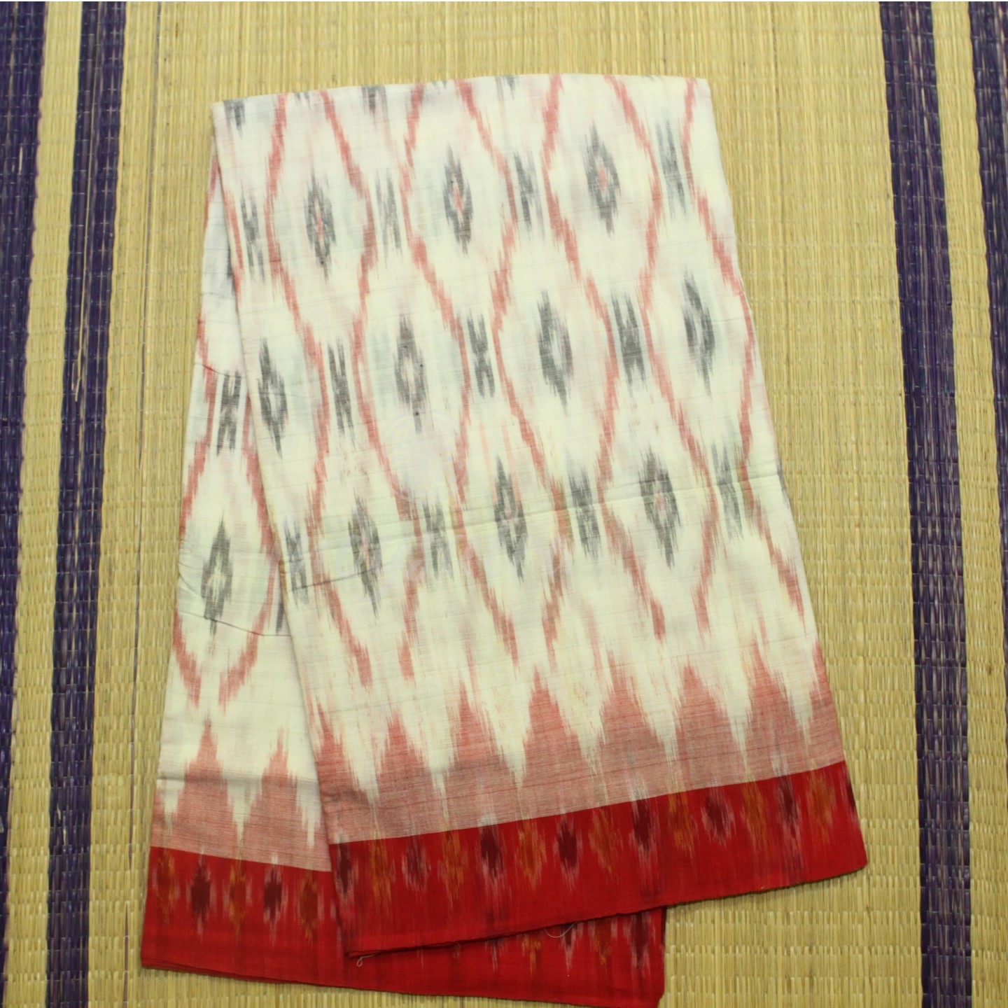 Kora white with red border ikkat saree