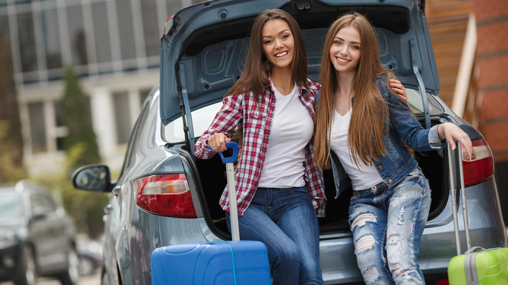two-young-friends-traveller-with-suitcase_624325-194.jpg