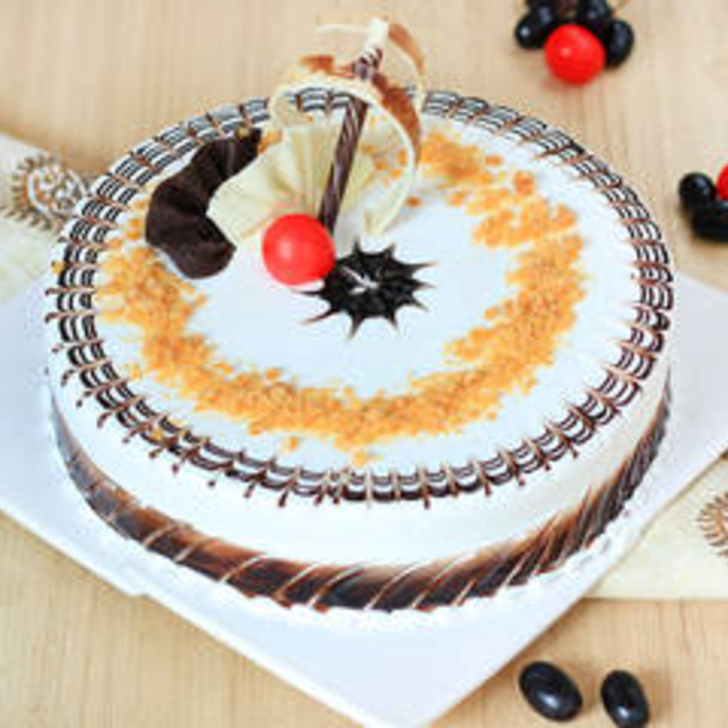 Round Butterscotch Cake With Chocolate Hints 500 grams