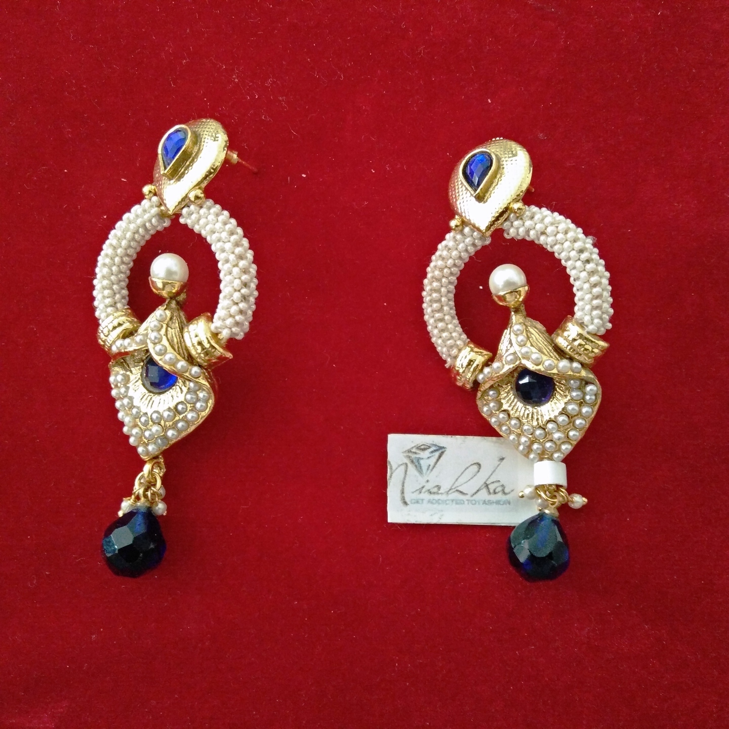 White Pearl earrings with blue stones