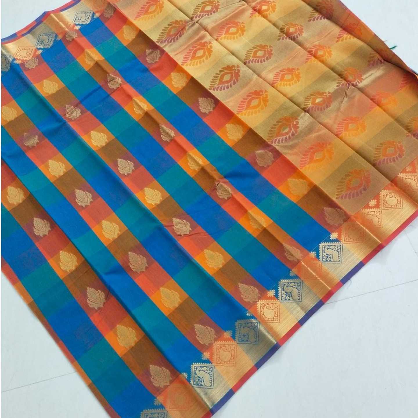 Shri Venkateshwara textiles Kotta Silk Cotton Blue and Orange colour Checked Saree