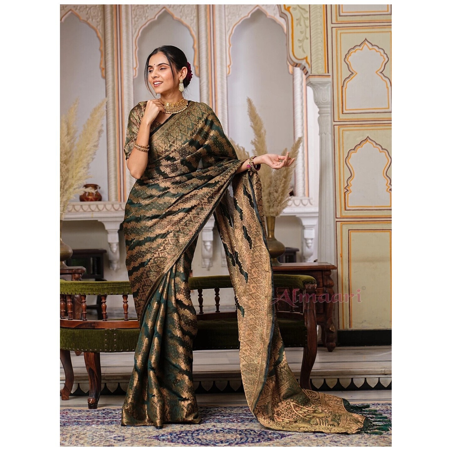 Dark Green Color Pure Organza Saree Adorned with Zari Weaving, Complete with Matching Blouse Piece 