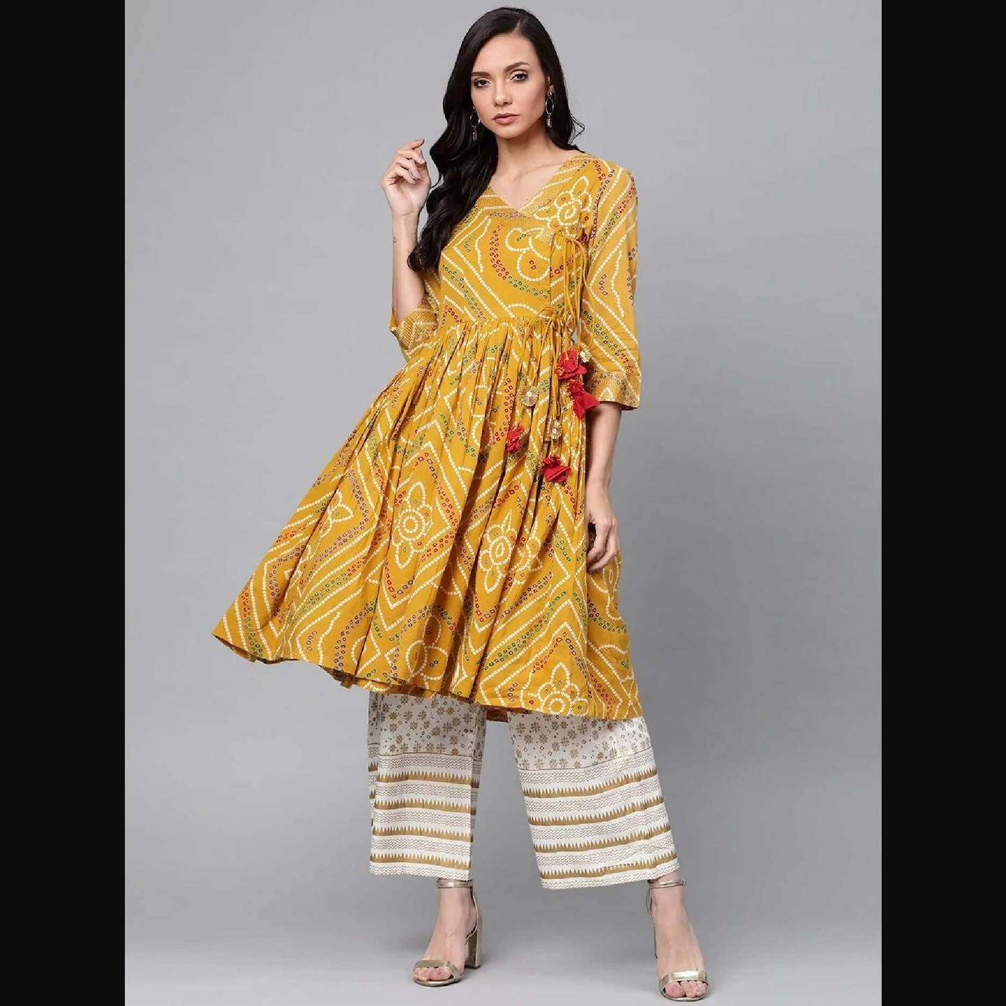 Women Yellow Bandhani Print Kurta with Palazzos by Anubhutee (Set of 2)