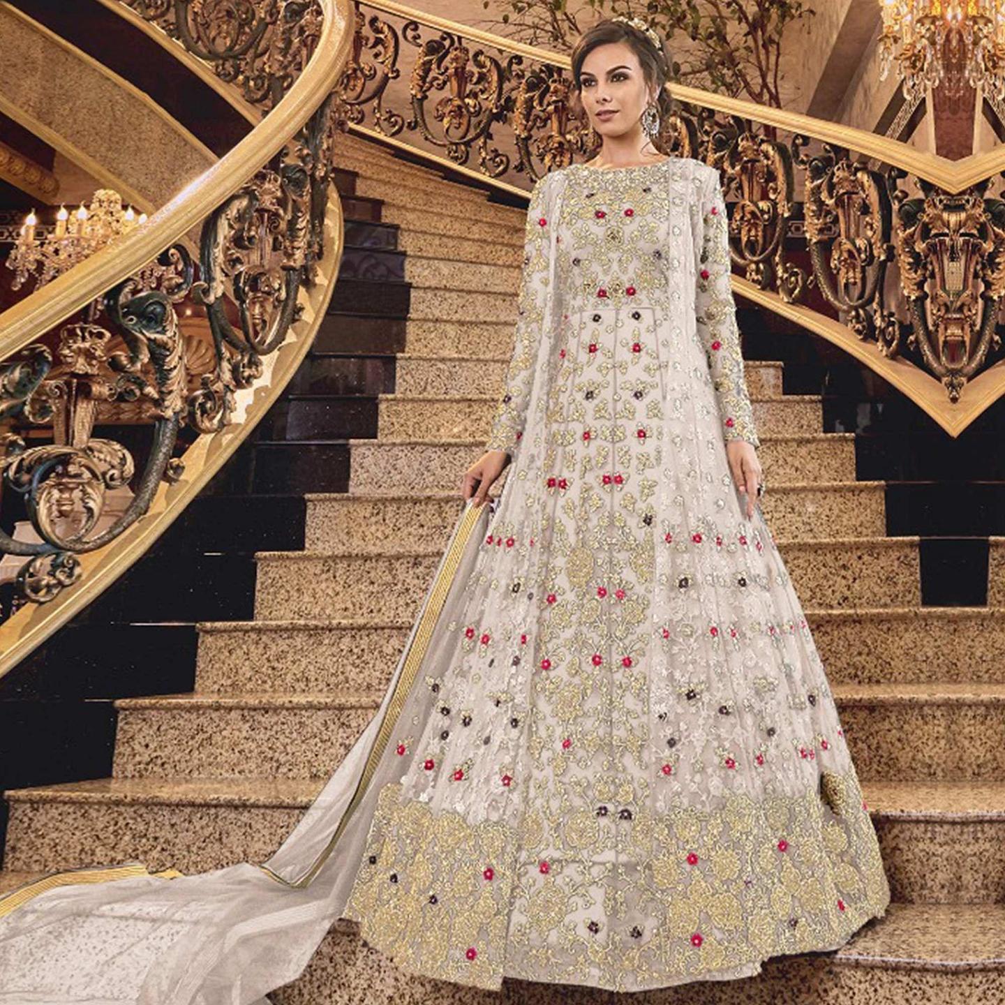 Sophisticated White Colored Partywear Embroidered Abaya Style Soft Net Anarkali Suit Semi- Stitched