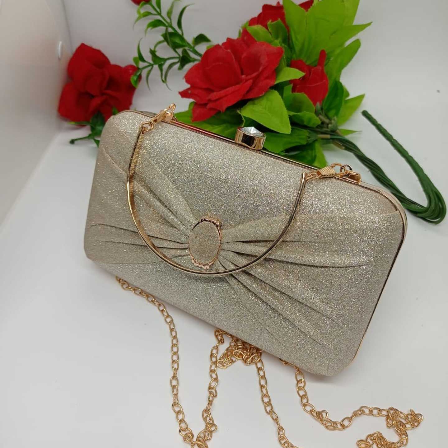 Light golden bow clutch